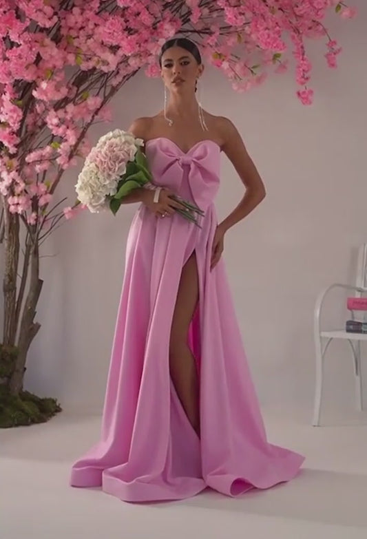 Elegant Long Pink Dress with Bow Detail and Adjustable Straps